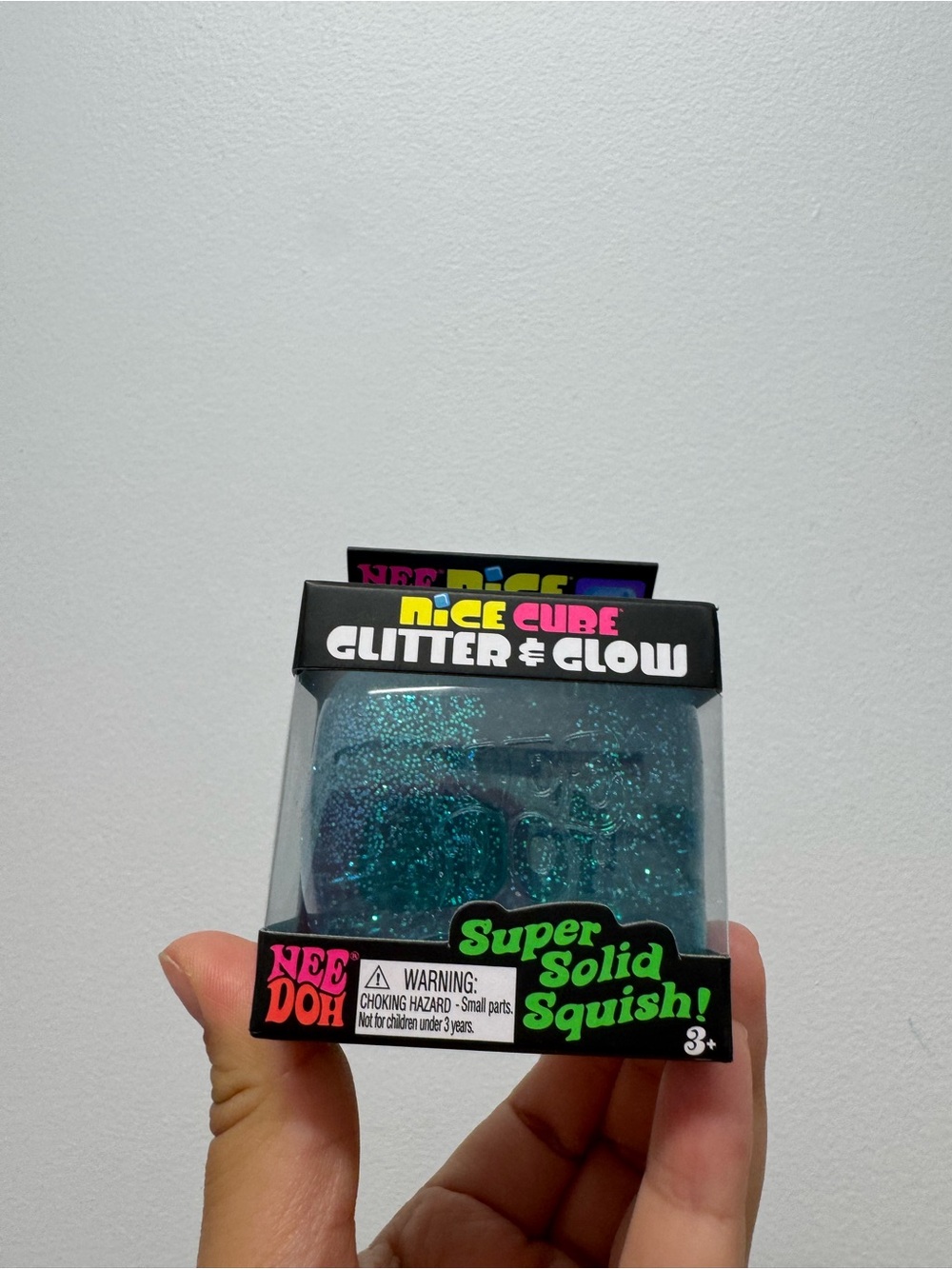 NEEDOH Nice Cube Glitter & Glow Super Solid Squish - Aqua Blue